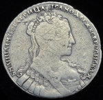 1 рубль 1734 г. Анна Иоанновна. Лирический портрет. Большая голова. Крест короны разделяет надпись.  (Рубль 1734  ("переходный" портрет))
