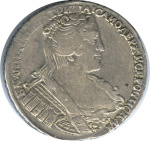 Полтина 1733 г. Анна Иоанновна. Портрет смещен влево. Крест державы простой (Полтина. 1733)